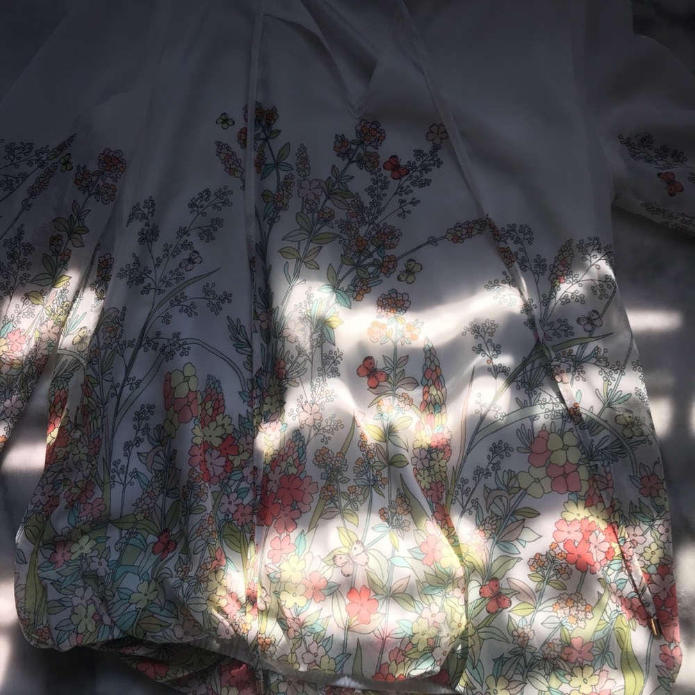 A cute white blouse with floral